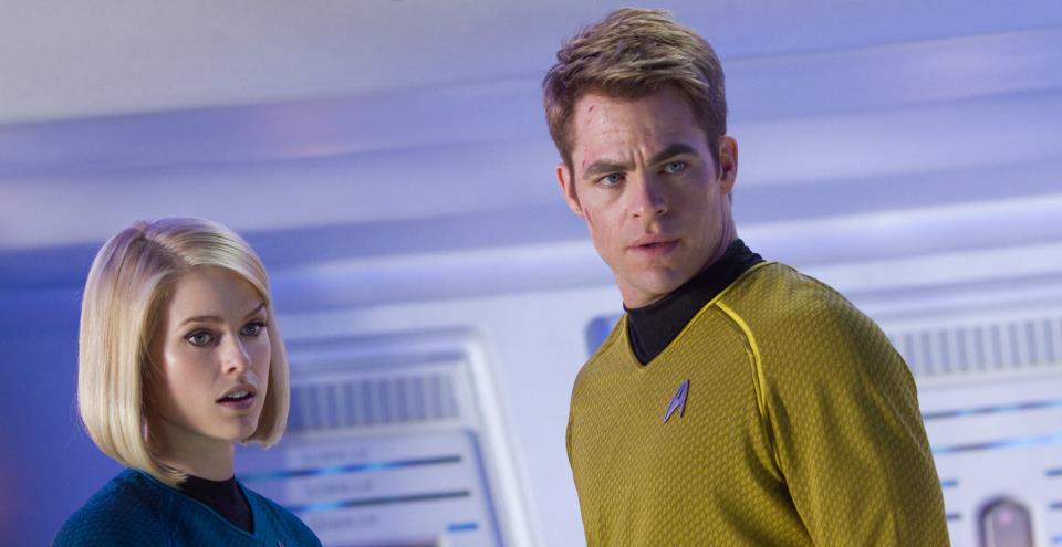 Alice Eve as Dr. Carol Marcus and Chris Pine as Captain Kirk