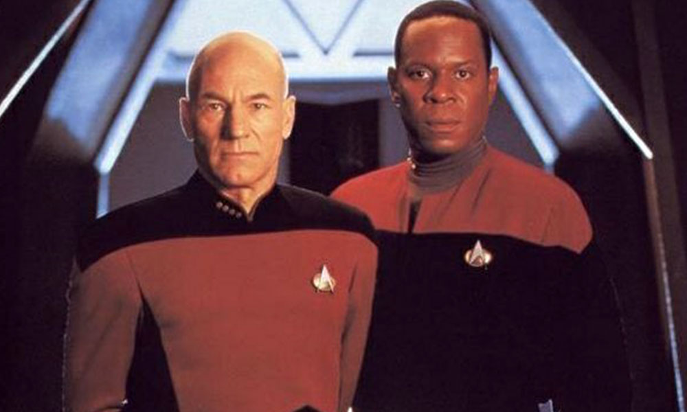 Patrick Stewart as Captain Picard and Avery Brooks as Captain Sisko